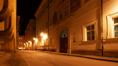 SALZBURG, AUSTRIA - FEBRUARY 3, 2024: On the street in old town at eveningのeditorial素材