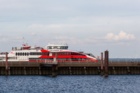 CUXHAVEN, GERMANY - AUGUST 15, 2024: HALUNDER JET, a high-speed vessel flying the Cyprus flag,...