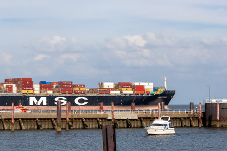 CUXHAVEN, GERMANY - AUGUST 15, 2024: The container ship MSC Laura sails past Cuxhaven
