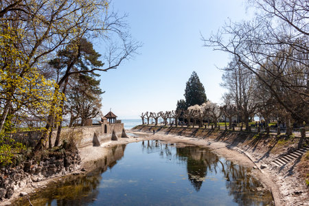 A serene and picturesque view of the historic waterfront in Konstanz (Constance), Germany, along Lake Constance (Bodensee)の写真素材