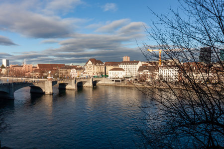 Elevated view of the Mittlere BrÃ¼cke spanning the Rhine River in Basel, Switzerland, with the...