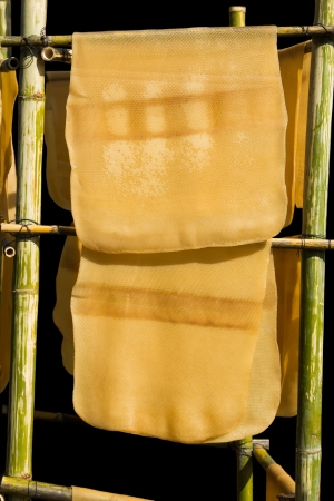 Para rubber dry sheet by smoked and drying with sunlight process の写真素材