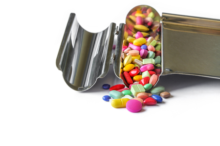 Close up of medical pills on stainless steel counting tray.の写真素材