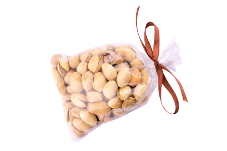 Isolated Pistachio Nut Sack. Logotype Concept.の写真素材