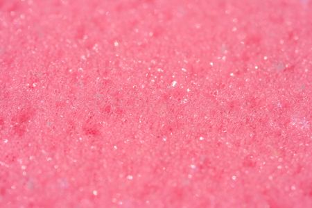 Close-up of a pink bath and shower sponge の写真素材