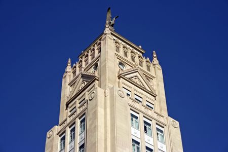 Top of a Madrid skyscraper with a blue skyの写真素材