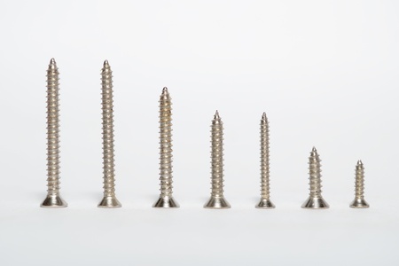 Metal screws on a white background   の写真素材