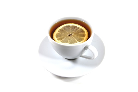 Tea with lemon in the white cupの写真素材