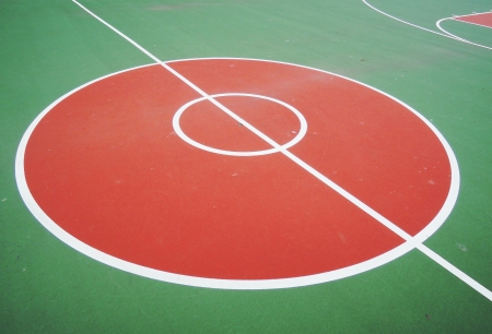 colorful basketball lines on an outdoor courtの写真素材