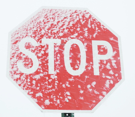 stop sign with snowの写真素材