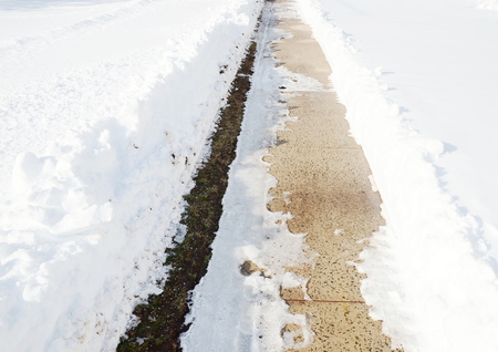 Sidewalk with snowの写真素材