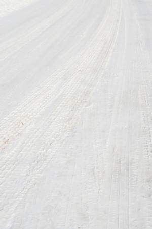 Tire tracks in snowの写真素材