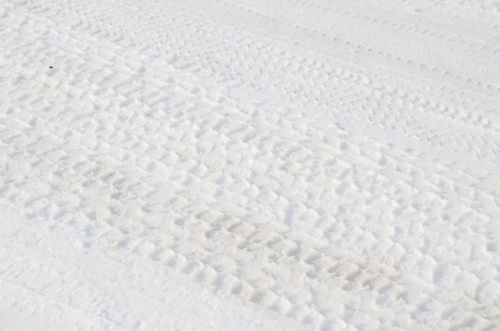 Tire tracks in snowの写真素材