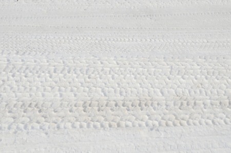 Tire tracks in snowの写真素材
