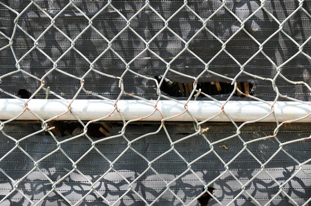 Broken fenceの写真素材