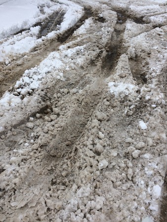 Tire tracks in snowの写真素材