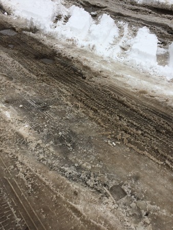 Tire tracks in snowの写真素材