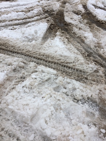 Tire tracks in snowの写真素材