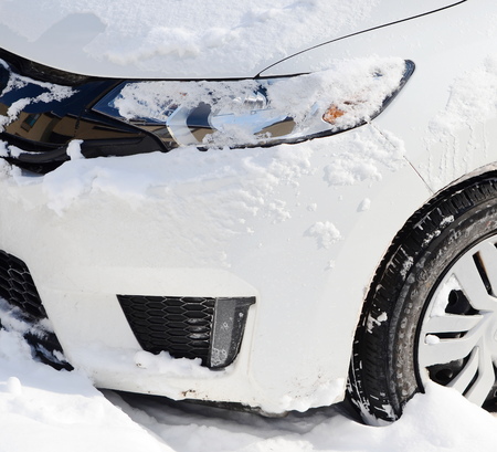 headlight car with snowの写真素材