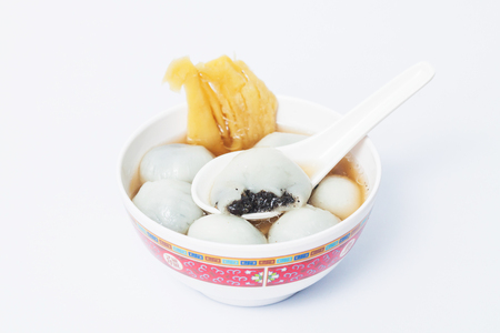 Black seasame dompling in ginger  tea recipesの写真素材