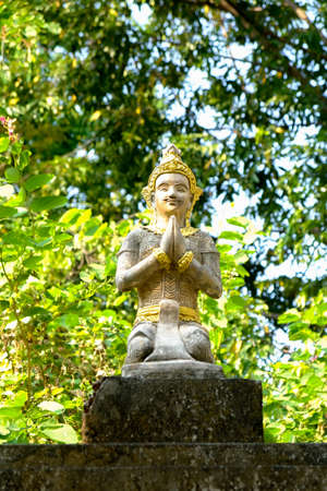 Beautiful ancient stucco carving life size deities on wall of historic Wat Chet Yot or Wat Jed Yod buddhist temple, famous landmark of Chiang Mai, Thailandの写真素材