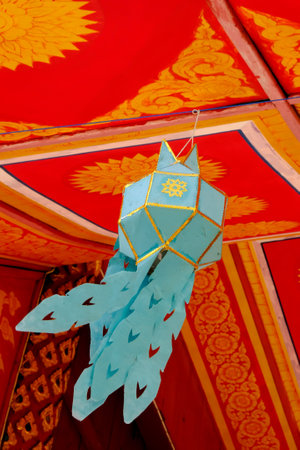 Colorful Lanna hanging lamp in temple at Thailand,isolated art wall.の写真素材