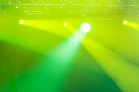 Stage lights on concert. Lighting equipment with multicolored beams.の写真素材