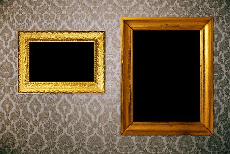 Gold frame over vintage wallpaperの写真素材