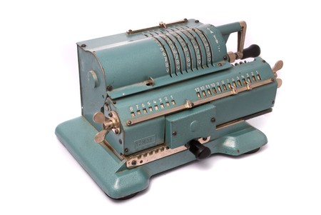 Vintage calculator on a white backgroundの写真素材