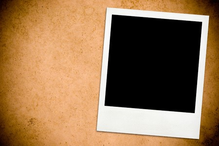 Blank vintage photo on grunge paper backgroundの写真素材