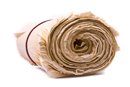 Rolled up old paperの写真素材