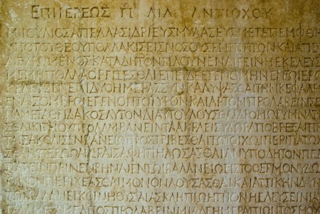 Stone background with antique Greek inscriptionsの写真素材