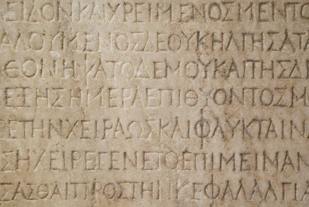 Stone background with antique Greek inscriptionsの写真素材