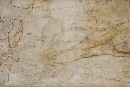 Stone background with antique Greek inscriptionsの写真素材