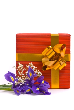 Bouquet of a irises and gift box on white backgroundの写真素材