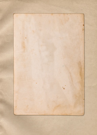 Vintage photo frame on ancient paper の写真素材