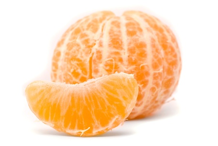 Juicy tangerine on a white backgroundの写真素材