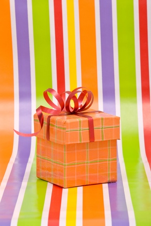 Gift box on a stripe backgroundの写真素材