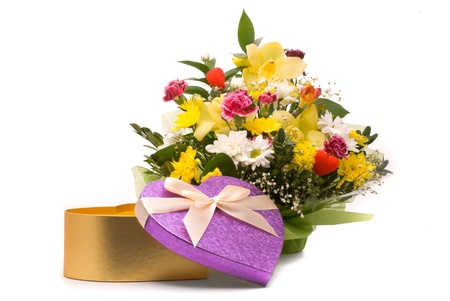 Magnificent bouquet and present box on a whiteの写真素材