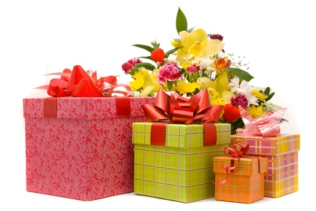 Magnificent bouquet and present boxes on a white の写真素材