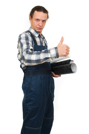 Worker with wallpapers in hands on white backgroundの写真素材