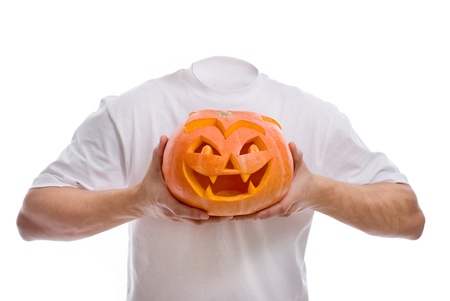 Halloween man without a head with a pumpkin in the hands.の写真素材