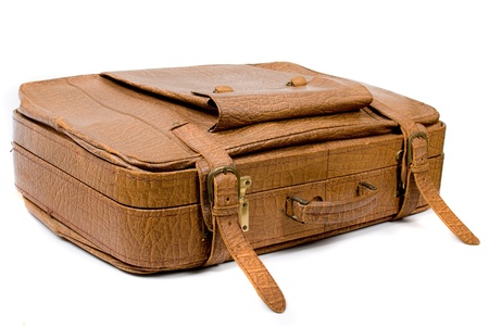 Old suitcase isolated on a white backgroundの写真素材
