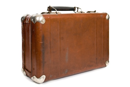 Old suitcase isolated on a white backgroundの写真素材