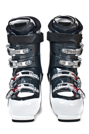 Modern professional ski boots isolated on white background の写真素材
