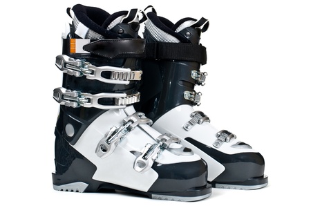 Modern professional ski boots isolated on white backgroundの写真素材