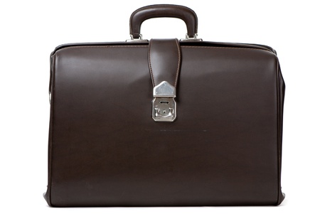 Old suitcase isolated on a white backgroundの写真素材