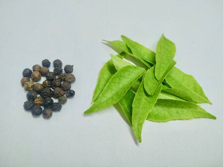 Chili Pepper, Black Pepper, curry leaf On A White Background Stock.this photo is taken in india by...