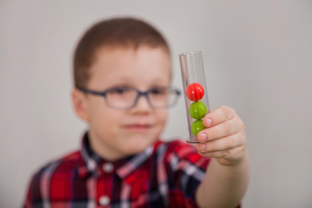 Boy with glasses as a scientistの写真素材