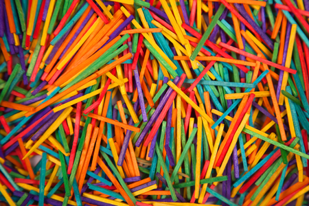 Colored wooden sticks, color background for creativityの写真素材